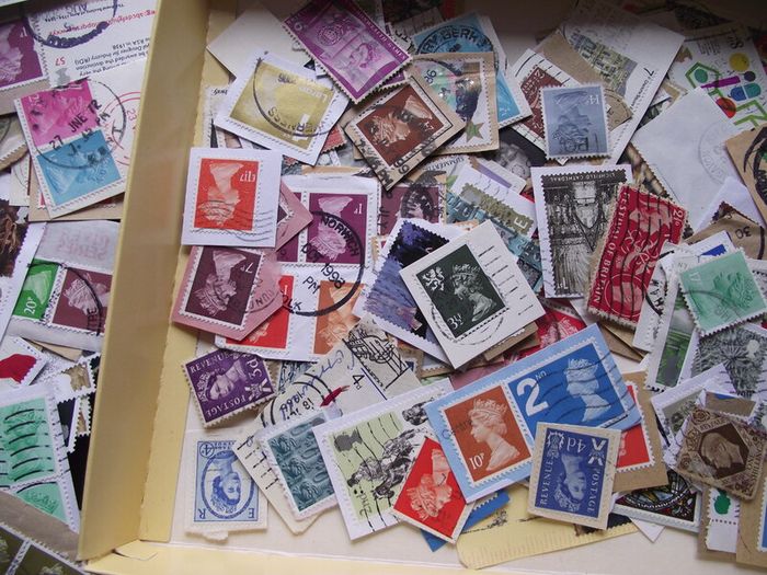 A box with collection of stamps from Great Britain