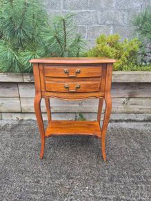 vintage French Provincial or Louis XV-style wooden bedside table/side chest featuring two drawers, cabriole legs, and a lower open shelf