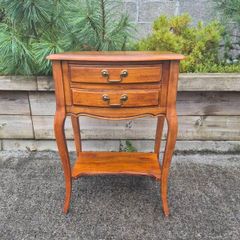 vintage French Provincial or Louis XV-style wooden bedside table/side chest featuring two drawers, cabriole legs, and a lower open shelf
