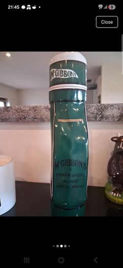 Stunning vintage McGibbon's ceramic golf bag whiskey decanter