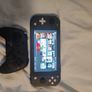 Nintendo switch + controller+20 games installed on it Image 6