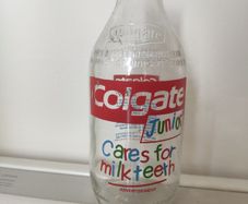 Unigate 1980s milk bottle Colgate