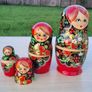 A set of five hand-painted, traditional Russian dolls Image 6