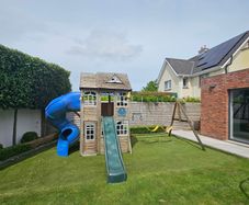 Garden playhouse and swing set