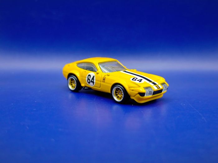 Hot Wheels Ferrari 365 GTB4 C with custom wheels.