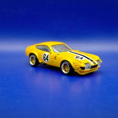 Hot Wheels Ferrari 365 GTB4 C with custom wheels.