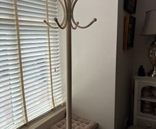 Cream metal coat hanging stand