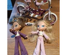 Bratz kids Yasmin and Chloe and bike