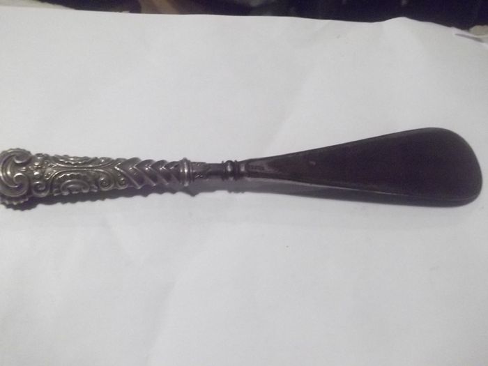 a antique silver handle and steel shue horn