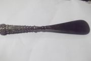 a antique silver handle and steel shue horn