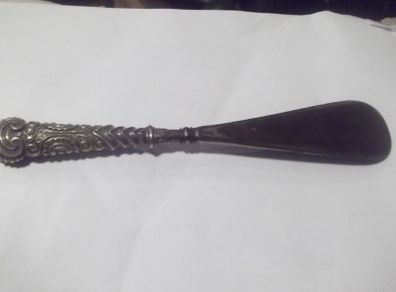 a antique silver handle and steel shue horn