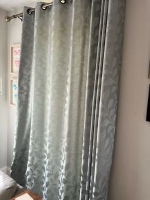Set of two eyelet curtains and curtain poles