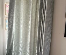 Set of two eyelet curtains and curtain poles