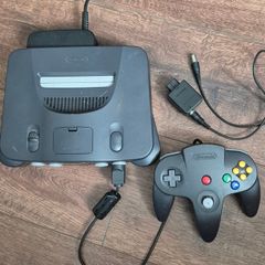 Nintendo 64 console with controller and cable