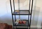 Walnut and black metal shelving unit