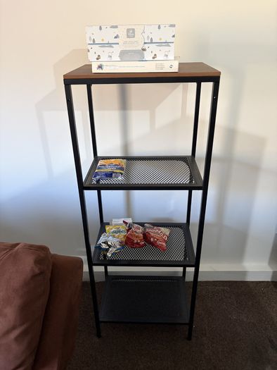 Walnut and black metal shelving unit