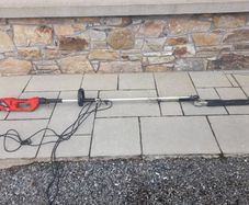 Electric long reach hedge trimmer