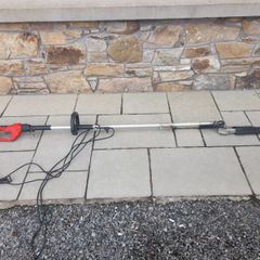 Electric long reach hedge trimmer