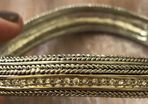 Knight and Day silver and gold tone bangle
