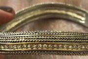 Knight and Day silver and gold tone bangle