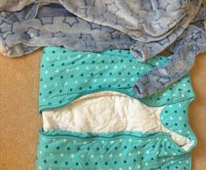 sleeping sack and 2 fleece suits 2-3 age