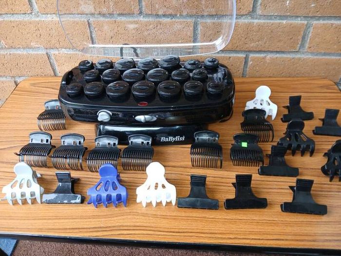 New BaByliss heated hair roller kit including rollers and clips.