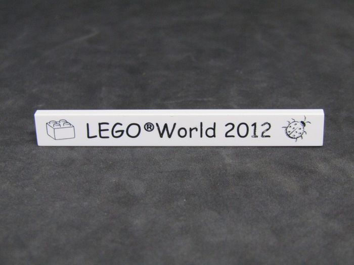 Lego World Fair Promotion Tile from Denmark 2012 A Rare Promotion Tile From Private Collection Collected At The Lego World Fair in Bella Center Copenhagen Denmark February 2012 RARE AND HARD TO FIND