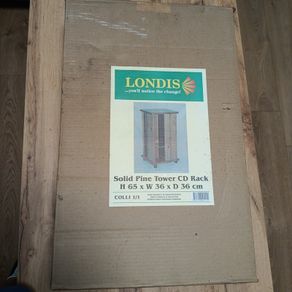 Brand new, unopened Londis solid pine tower CD Rack