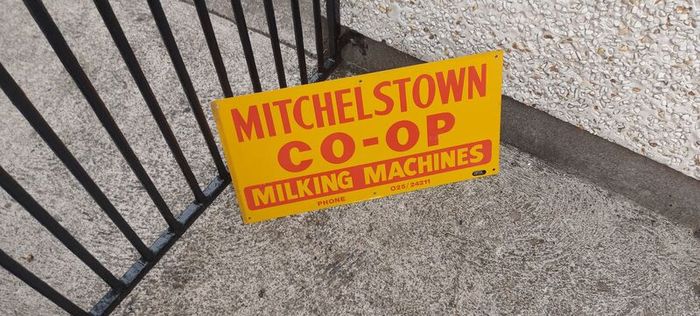 Mitchelstown hay barn advertising,sign by currans of Clonmel,,original ,came out of the offices in mitchelstown branch ,,,few marks  ,lovely advertising display item, for any garage ,man cave or personal collection, sold as is