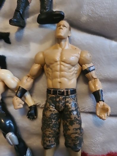 13 WWE wrestling figures