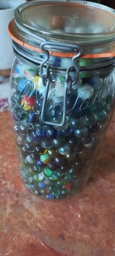 Antique collection of old marbles in large clip sealed jar it's full to the top loft find from very old house in France Beautiful