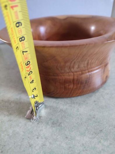 Beautiful  handmade wood turning. wood bowl has natural knot inside the bowl excellent condition