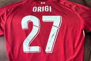 Origi signed Liverpool jersey