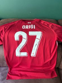 Origi signed Liverpool jersey