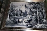 Black and white oil painting in silver frame