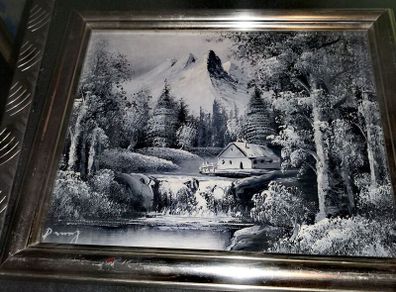 Black and white oil painting in silver frame