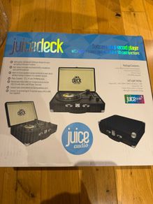 The juice deck ! Suitcase vinyl record player with built in stereo speakers. Brand new in the box unwanted present