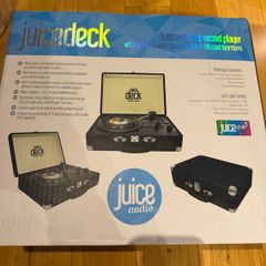 The juice deck ! Suitcase vinyl record player with built in stereo speakers. Brand new in the box unwanted present