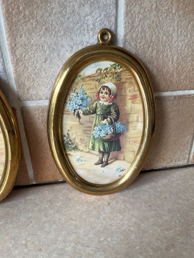 Vintage Pair Wall oval Brass frames features a young girl holding flowers