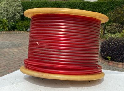 Reel of plastic tubing