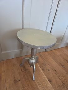 2 small metal tables