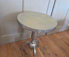 2 small metal tables