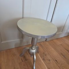 2 small metal tables