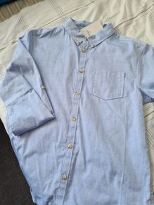 new boys blue shirt