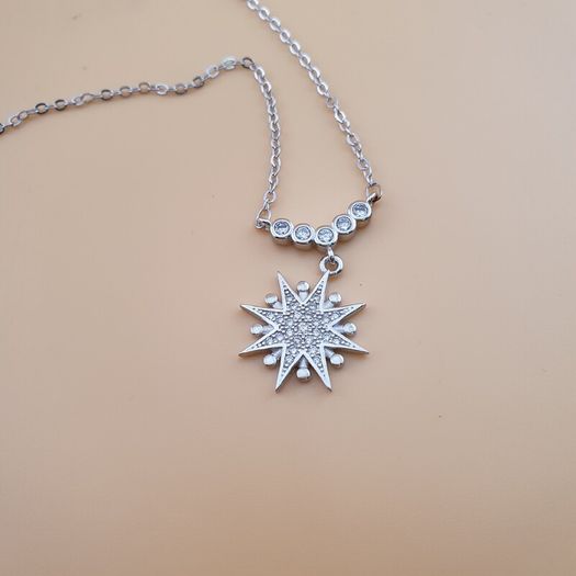 925 Sterling Silver Sparkling Sunburst Pendant Necklace with CZ Stones Elegant Radiant Star Design