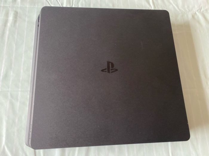 PlayStation 4 PS4 Console with controllers