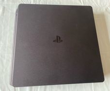 PlayStation 4 PS4 Console with controllers