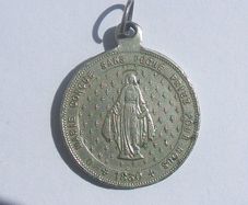 A vintage Miraculous Medal of the BVM (Blessed Virgin Mary) 1950s to 1970s