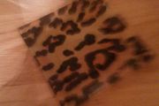 Rose flower candle with leopard print plate