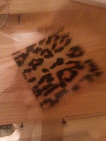 Rose flower candle with leopard print plate